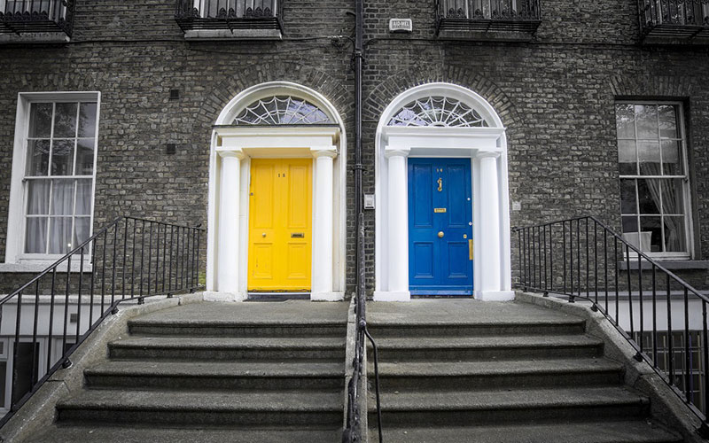 Two front doors taken from street view